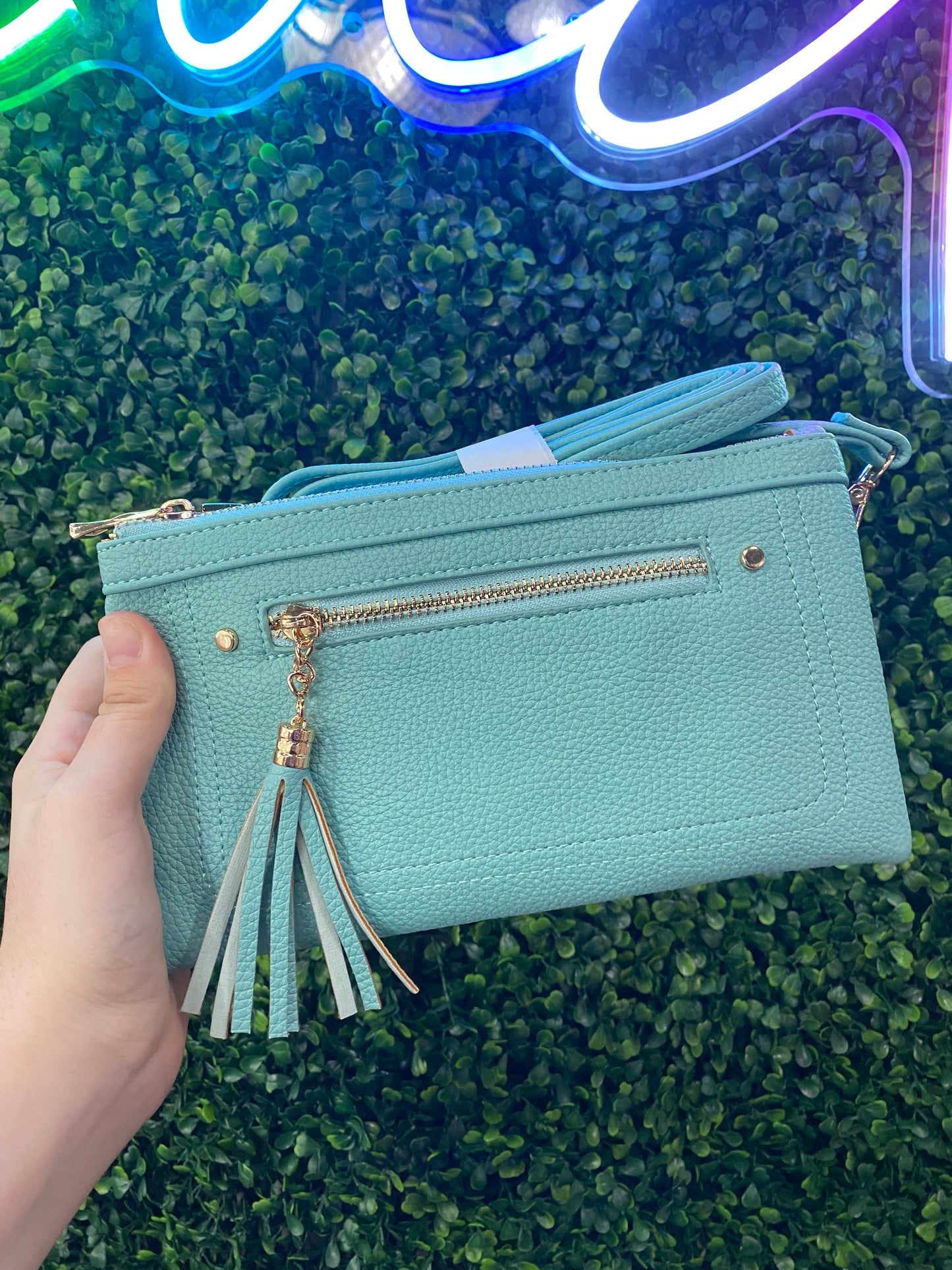 CROSSBODY CLUTCH WITH TASSLE