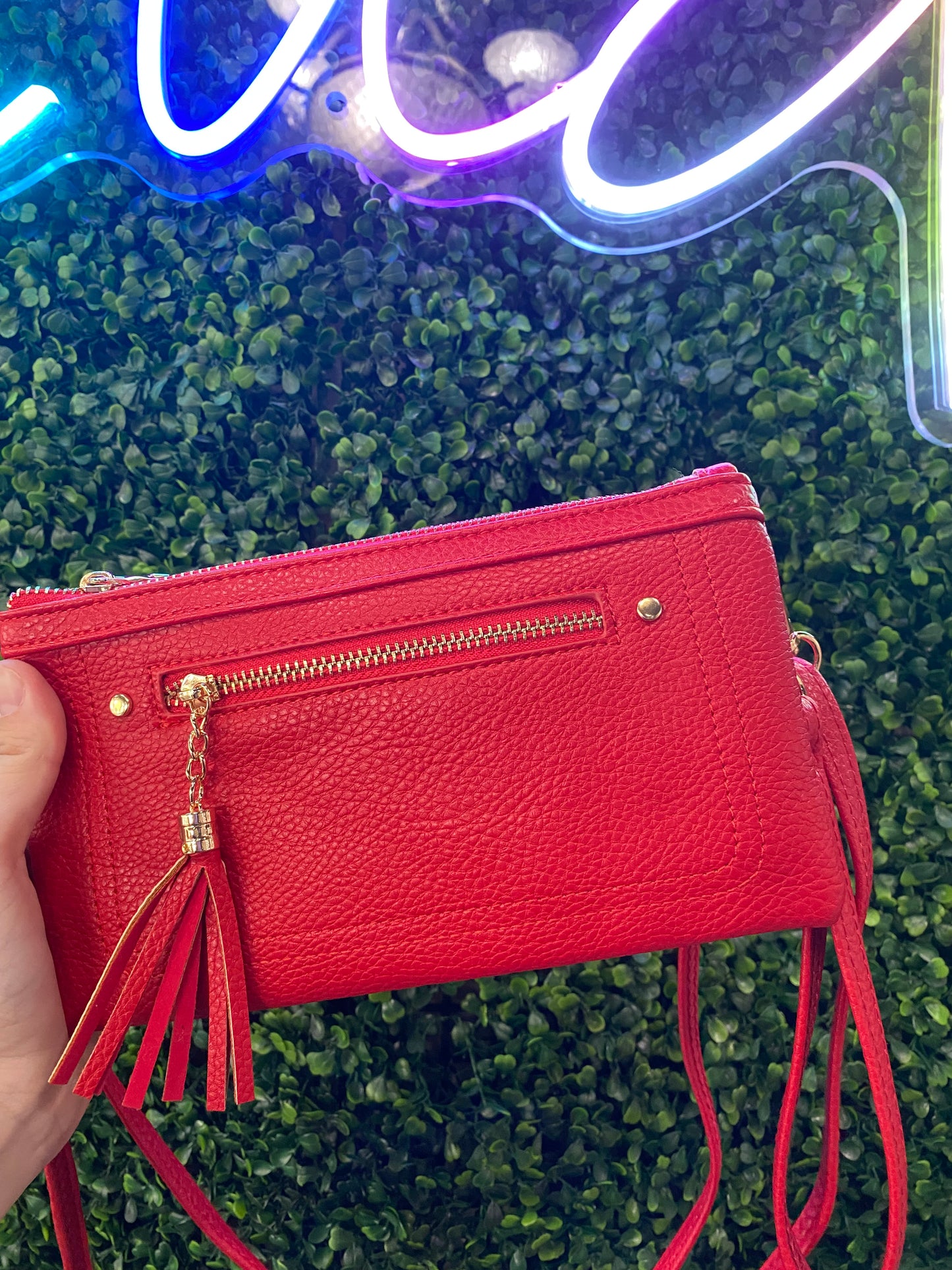 CROSSBODY CLUTCH WITH TASSLE