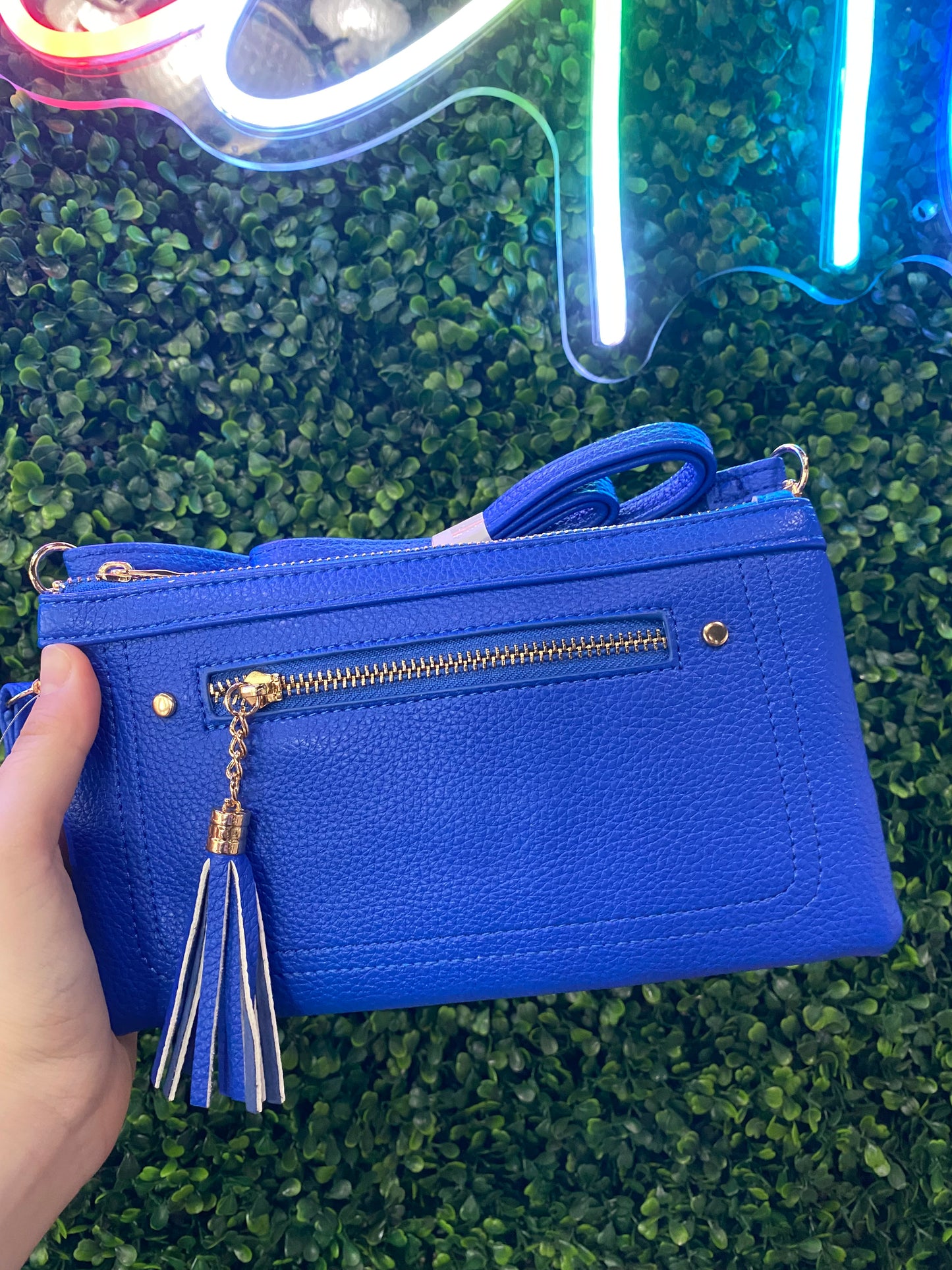 CROSSBODY CLUTCH WITH TASSLE