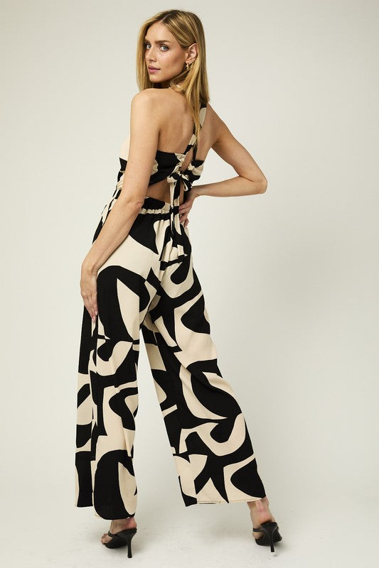 HALTER NECK ABSTRACT JUMPSUIT