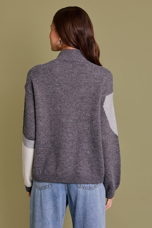 MOCK NECK ABSTRACT SWEATER